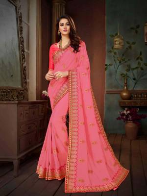 Look Pretty In This Elegant Looking Designer Saree In Pink Color Paired With Dark Pink Colored Blouse. This Saree Is Fabricated On Chinon Silk Paired With Art Silk Fabricated Blouse. It Is Light Weight And easy To Carry All Day Long. 