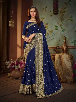 Enhance Your Personality Wearing This Attractive Looking Heavy Designer Saree In Navy Blue Color Paired With Navy Blue Colored Blouse. This Saree And Blouse Are Silk Based Beautified Attractive Jari Work. 