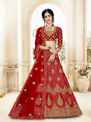 Grab This Heavy Designer Lehenga Choli In All Over Red Color. Its Blouse Is Fabricated On Art Silk Paired With Jacquard Silk Fabricated Lehenga And Net Fabricated Dupatta. It Is Beautified With Weave And Embroidery Which Is Making It More Attractive. 