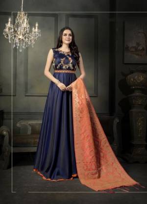 Enhance Your Personality Wearing This Heavy Designer Floor Length?Suit In Navy Blue Color Paired With Contrasting Orange Colored Dupatta. Its Top Is Fabricated On Satin Georgette Paired With Santoon Bottom And Banarasi Art Silk Dupatta.