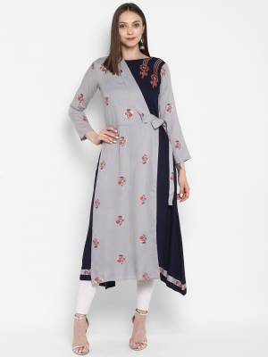 Designer Patterned Readymade Kurti Is Here In Grey And Navy Blue Color Fabricated On Rayon. It Is Beautified With Prints And Thread Work. 