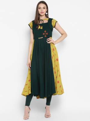 New Shade Is Here With This Designer Readymade Kurti In Pine Color. This Pretty Patterned Kurti Is Fabricated On Rayon Beautified with Prints And Thread Work. Its Fabric Is Light Weight And Easy To Carry All Day Long. 