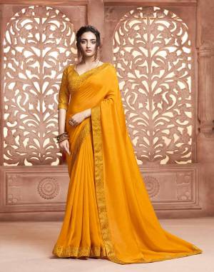 Celebrate This Festive Season With Beauty and Comfort Wearing This Designer Saree In Yellow Color . This Saree Is Fabricated On Satin Silk Paired With Art Silk Fabricated Weave Blouse. It Is Beautified With Weave Lace Border Over The Saree. Buy Now.