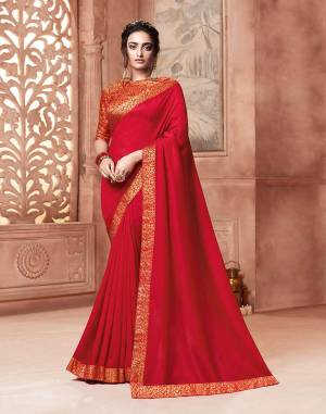 Celebrate This Festive Season With Beauty and Comfort Wearing This Designer Saree In Red Color . This Saree Is Fabricated On Satin Silk Paired With Art Silk Fabricated Weave Blouse. It Is Beautified With Weave Lace Border Over The Saree. Buy Now.