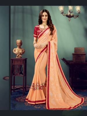 Grab This Beautiful Designer Saree In Light Orange Color Paired With Contrasting Red Colored Blouse. This Saree Is Fabricated Chiffon Paired With Art Silk Fabricated Blouse. Buy This Saree Now.