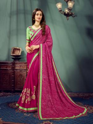 Shine Bright Wearing This Attractive Looking Designer Saree In Magenta Pink Color Paired With Contrasting Light Green Colored blouse. This Saree Is Fabricated On Chiffon Paired With Art Silk Fabricated Blouse. 