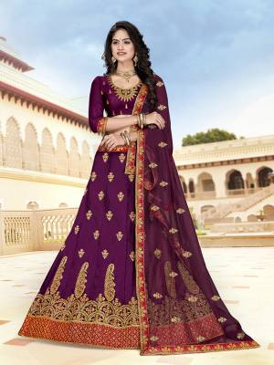 Attract All Wearing This Heavy Designer Lehenga Choli In All Over Purple Color. This Lehenga Choli Is Art Silk Based Paired With Net Fabricated Dupatta. Buy Now.