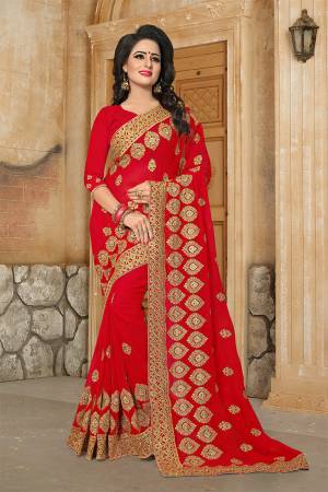 Grab This Very Beautiful And Attractive Looking Heavy Designer Saree In Red Color. This Saree And Blouse Are Fabricated On Georgette Beautified With Heavy Jari Embroidery & Stone Work. Buy Now.