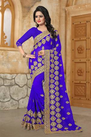 Grab This Very Beautiful And Attractive Looking Heavy Designer Saree In Violet Color. This Saree And Blouse Are Fabricated On Georgette Beautified With Heavy Jari Embroidery & Stone Work. Buy Now.