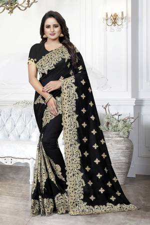 Get Ready For The Upcoming Wedding Season With This Heavy Designer Saree In Black Color. This Saree And Blouse are Silk Based Beautified With Heavy Embroidery With Cut Work. This Saree Is Suitable For Wedding And Festive Wear. Buy This Heavy Attractive Saree Now.