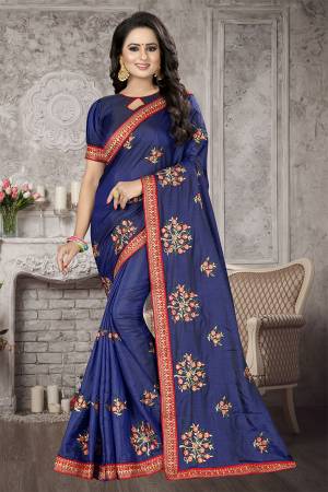 Add This Designer Saree To Your Wardrobe In Navy blue color Fabricated On Satin Silk, Its Pretty Embroidered Motifs And Rich Silk Fabric Will Earn You Lots Of Compliments From Onlookers. 