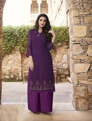 Shine Bright In This Designer Piece Of Kurti And Plazzo In Purple Color. This Pretty Readymade Kurti Is Fabricated On Georgette And Soft Silk Paired With Soft Silk Fabricated Plazzo. Its Fabrics Are Soft Towards Skin And Easy To Carry All Day Long. 