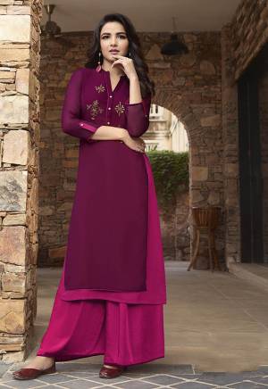 Shine Bright In This Designer Piece Of Kurti And Plazzo In Magenta Pink And Rani Pink Color. This Pretty Readymade Kurti Is Fabricated On Georgette And Soft Silk Paired With Soft Silk Fabricated Plazzo. Its Fabrics Are Soft Towards Skin And Easy To Carry All Day Long. 