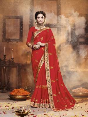 Celebrate This Festive Season With Beauty and Comfort Wearing This Designer Saree In Red Color. This Saree Is Fabricated On Satin Silk Paired With Art Silk Fabricated Dupatta. It IS Beautified With Contrasting Embroidered Motifs All Over With Lace Border Giving It an Attractive Look. 