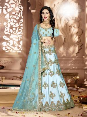Grab This Rich And Elegant Looking Heavy Designer Lehenga Choli In Sky Blue Color. Its Blouse Is fabricated On art Silk Paired With Satin Silk Lehenga And Net Fabricated Dupatta. It Is Beautified With Heavy Jari And Resham Embroidery With Stone Work. Buy This Pretty Piece Now.