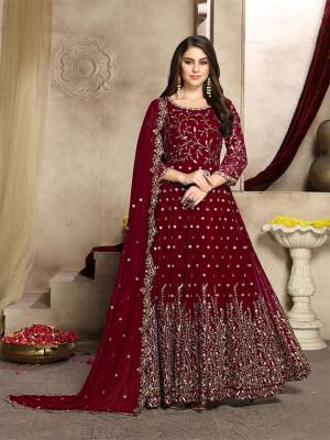 Here Is A Prefect Outfit For This Festive And Wedding Season Wearing This Heavy Designer Floor Length Suit In Maroon Color. Its Embroidered Floor Length Top And Dupatta are fabricated on Georgette Paired With Santoon Bottom. It Is Light In Weight and Easy To Carry All Day Long. Buy Now.