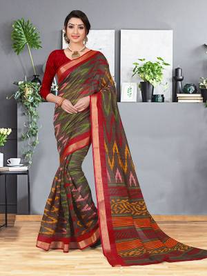 For Your Semi-Casual Wear, Grab This Cotton Based Saree In Brown And Multi Color Paired With Contrasting Red Colored Blouse. This Saree And Blouse Are Fabricated On Cotton Silk Beautified With Printes And Weaved Border. Buy Now. 