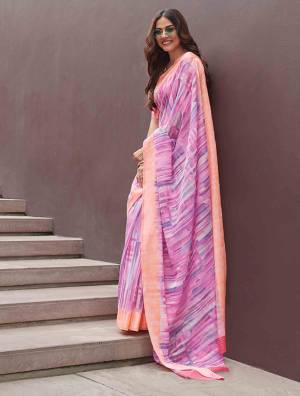 Grab This Petty Simple Saree In Pink Color Paired With Pink Colored Blouse. This Saree And Blouse Are Fabricated On Soft Linen Beautified With Lining Pints All Over. 