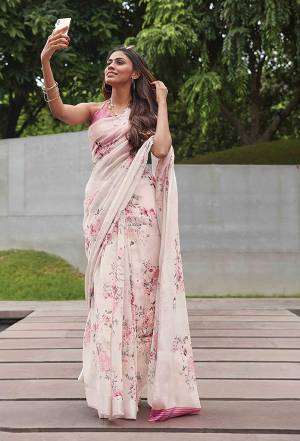 Simple And Elegant Looking Designer Printed Saree Is Here In Off-White Color Paired With Pink Colored Blouse. This Pretty Soft Linen Based Saree IS Beautified With Pretty Floral Prints With In Lovely Color Pallete. 