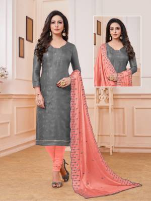 For A Rich Look, Grab This Designer Dress Material With Embroidered Top And Dupatta In Grey And Peach Color. Its Top Is Fabricated On Satin Linen Paired With Cotton Bottom And Chinon Fabricated Dupatta. Buy Now.