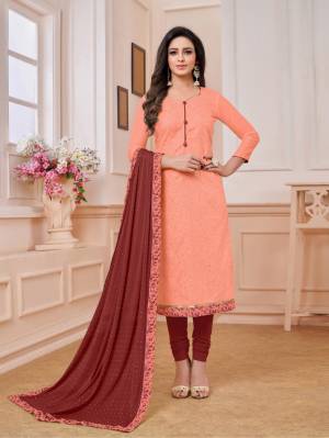 Look Pretty In This Very Beautiful And Designer Straight Suit In Orange Colored Top Paired With Maroon Colored Bottom And Dupatta. Its Top Is Fabricated On Modal Silk Paired With Cotton Bottom And Chiffon Fabricated Dupatta. 