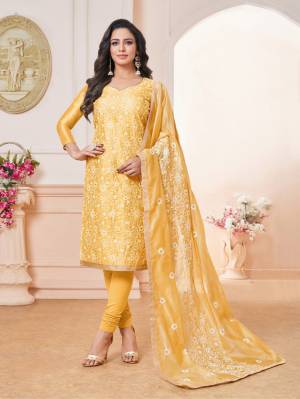 Add This Very Beautiful And Designer Straight Cut Suit In All Over Yellow Color. Its Heavy Embroidered Top And Dupatta Are Fabricated On Modal Silk Paired With Cotton Fabricated Bottom. Buy This Dress Material And Get This Stitched As Per Your Desired Fit And Comfort. 