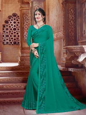 Grab This Beautiful Designer Saree In Sea Green Color For The Upcoming Festive And Wedding Season. This Saree And Blouse are Fabricated On Georgette Beautified With Tone To Tone Embroidery. It Is Light In Weight And Easy To Carry All Day Long. 