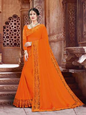 Grab This Beautiful Designer Saree In Orange Color For The Upcoming Festive And Wedding Season. This Saree And Blouse are Fabricated On Georgette Beautified With Tone To Tone Embroidery. It Is Light In Weight And Easy To Carry All Day Long. 