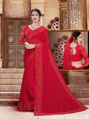 Grab This Beautiful Designer Saree In Red Color For The Upcoming Festive And Wedding Season. This Saree And Blouse are Fabricated On Georgette Beautified With Tone To Tone Embroidery. It Is Light In Weight And Easy To Carry All Day Long. 