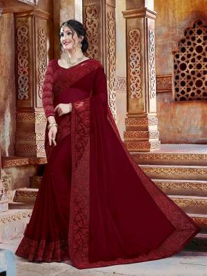 Shine Bright In This Attractive Looking Designer Saree In Maroon Color. This Saree And Blouse Are Fabricated On Georgette Beautified With Subtle Tone To Tone Embroidery. Buy This Saree Now.