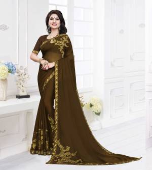 Add This New Shade To Your Wardrobe With This Designer Saree In Dark Olive Green Color. This Saree Is Fabricated On Satin Georgette Paired With Art Silk Fabricated Blouse. It Is Beautified With Attractive Minimal Embroidery. Buy Now.