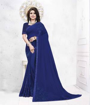Celebrate This Festive Season With Beauty And Comfort Wearing This Designer Saree In Royal Blue Color. This Pretty Saree Is Fabricated On Satin Georgette Paired With art Silk Fabricated Blouse. It Is Light Weight And Easy To Carry All Day Long. 