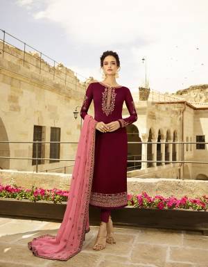 Attract All In This Very Beautiful Heavy Designer Straight Suit In Maroon Colored Top and Bottom Paired With Contrasting Pink Colored Dupatta. Its Top Is Fabricated On Satin Georgette Paired With Santoon Bottom And Georgette fabricated Dupatta. Its Top And Dupatta are Beautified With Heavy Embroidery. 