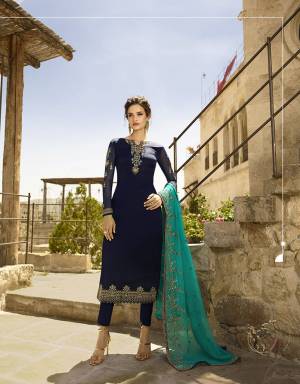 Enhance Your Personality In This Designer Straight Suit In Navy Blue Color paired With Blue Colored Dupatta. Its Embroidered Top Is Fabricated On Satin Georgette Paired With Santoon Bottom And Georgette fabricated Heavy Embroidered Dupatta. 