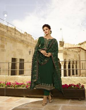 Beautiful Shade Is Here To Add Into Your Wardrobe With This Designer Straight Suit In All Over Dark Green Color. Its Embroidered Top Is Fabricated On Satin Georgette Paired With Santoon Bottom Paired With Santoon Bottom And Heavy Embroidered Georgette Fabricated Dupatta. 