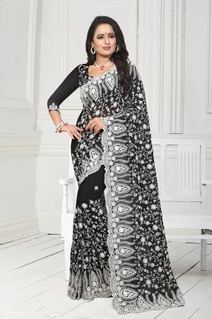 Get Ready For The Upcoming Wedding Season With This Heavy Designer Saree In Black Color. This Saree And Blouse Are Fabricated On Georgette. This Saree Is Suitable For Wedding And Festive Wear. Buy This Heavy Attractive Saree Now.