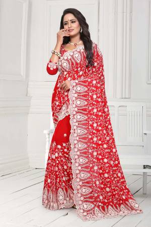 Get Ready For The Upcoming Wedding Season With This Heavy Designer Saree In Red Color. This Saree And Blouse Are Fabricated On Georgette. This Saree Is Suitable For Wedding And Festive Wear. Buy This Heavy Attractive Saree Now.