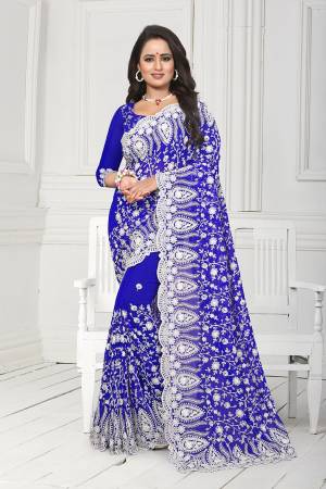 Get Ready For The Upcoming Wedding Season With This Heavy Designer Saree In Royal Blue Color. This Saree And Blouse Are Fabricated On Georgette. This Saree Is Suitable For Wedding And Festive Wear. Buy This Heavy Attractive Saree Now.