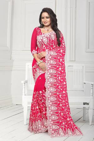 Get Ready For The Upcoming Wedding Season With This Heavy Designer Saree In Dark Pink Color. This Saree And Blouse Are Fabricated On Georgette. This Saree Is Suitable For Wedding And Festive Wear. Buy This Heavy Attractive Saree Now.