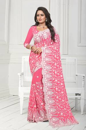 Get Ready For The Upcoming Wedding Season With This Heavy Designer Saree In Pink Color. This Saree And Blouse Are Fabricated On Georgette. This Saree Is Suitable For Wedding And Festive Wear. Buy This Heavy Attractive Saree Now.