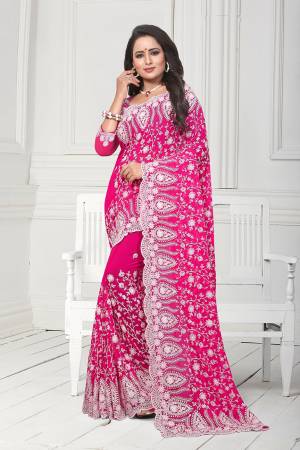 Get Ready For The Upcoming Wedding Season With This Heavy Designer Saree In Magenta Pink Color. This Saree And Blouse Are Fabricated On Georgette. This Saree Is Suitable For Wedding And Festive Wear. Buy This Heavy Attractive Saree Now.
