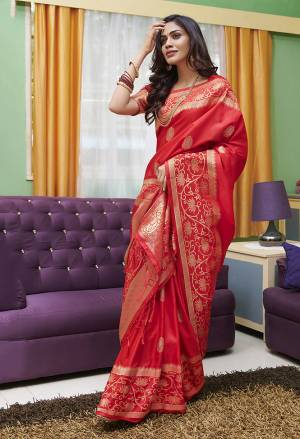 Grab This Pretty Silk Based Saree In Red Color Paired With Red Colored Blouse. This Saree And Blouse Are Fabricated On Soft Silk Beautified With Weave All Over. Buy This Saree Now.