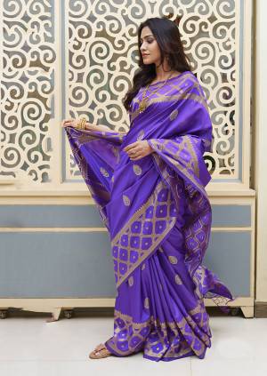 Look Attractive In This Purple Colored Designer Silk Saree In Purple Color Paired with Purple Colored Blouse. This Saree And Blouse are Fabricated On Soft Silk Beautified With Subtle Weave. 