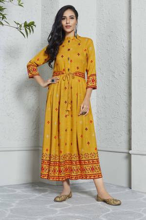 Celebrate This Festive Season With Beauty And Comfort Wearing This Designer Readymade Kurti In Musturd Yellow Color Fabricated On Rayon. This Pretty Kurti Is Beautified With Prints And Available In All Sizes. 