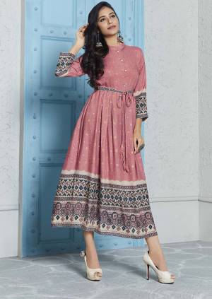 Look Beautiful Wearing This Designer Readymade Kurti In Dusty Pink Color Fabricated on Rayon. This Pretty Kurti Is In Calf Length So You can Wear It As It Is And Also You Can Pair It Up Leggings. 
