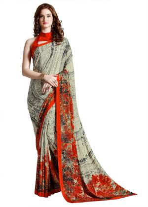 Add Some Casuals With This Pretty Saree Fabricated On Crepe. This?Saree And Blouse are Beautified With prints And It Is Light Weight And Easy To Carry All Day Long