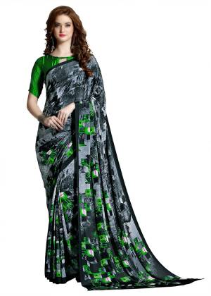 For Your Casuals Or Semi-Casuals, Grab This Light Weight Printed?Saree Fabricated On Crepe. Its Fabric IS Soft Towards Skin And Ensures Superb Comfort All Day Long. Buy Now.