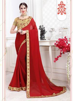 Attract All Wearing This Pretty Saree In Red Color Paired With Beige Colored Blouse. This Saree Is Fabricated On Chiffon Paired With Art Silk Fabricated Blouse. It Has Embroidered Lace Border Over Saree With Embroidered Blouse. 