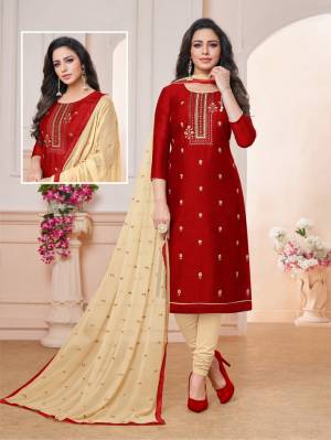 Grab This Pretty Dress Material For Your Semi-Casuals In Maroon Colored Top paired With Cream Colored Bottom And Dupatta. Its Embroidered Top Is Fabricated On Art Silk Paired With Cotton Bottom And Chiffon Fabricated Embroidered Dupatta. Buy Now
