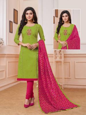 Celebrate This Festive Season With Beauty And Comfort Wearing This Designer Straight Suit In Green Color Paired With Contrasting Rani Pink Colored Bottom And Dupatta. Its Top Is Fabricated On Art Silk Paired With Cotton Bottom And Soft Silk Dupatta. 
